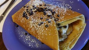 The King Vegan Crêpe with banana, sun butter, chocolate, and cashew cream at Firefly in West Seattle
