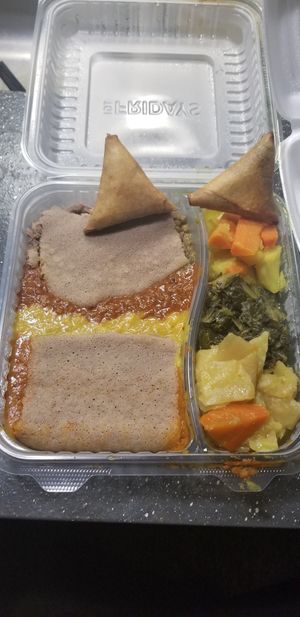 Veggie combo plate and spicy lentil samosas  at Desta Ethiopian in Dallas