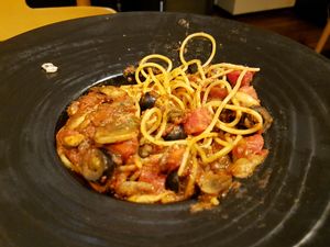 Half Eaten Tomato based Spaghetti with mushrooms and black olives at Soul R. Vegan Cafe in Taipei
