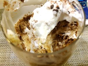 Half eaten Tiramisu. Strong coffee taste, very moist and creamy. Has chocolate bits sprinkled. at Soul R. Vegan Cafe in Taipei