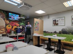 Help yourself to miso soup and prune juice. at Taiwan Sù 食在地台灣素食堂 in Taipei