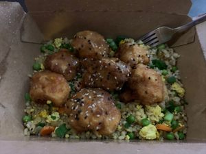 Orange cauliflower to go! Honestly, pretty dang good. It’s obviously good quality! I recommend this dish and the restaurant! at Native Foods - Clairemont Mesa in San Diego