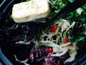One possible bibimbap with seaweed, bean sprouts, watercress and wild greens over black rice at Triple B Fresh in Washington