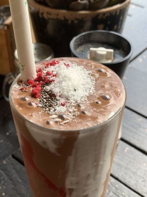 Up close and personal. Free dried raspberries and coconut/chia seeds on top  at Two Birds Eatery in Hamilton