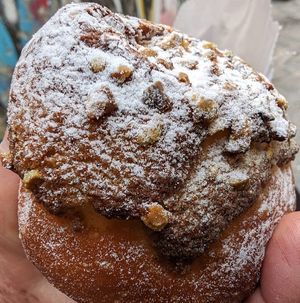 Delicious brioche filled with soft chocolate cream, crunchy nuts on top! at Vegan Art in Naples