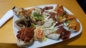 Cheese and faux-meat platter at Vegan Art in Naples