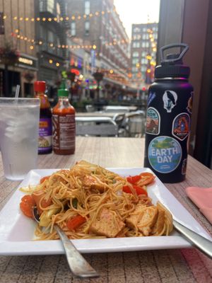 Curry noodles with a view of the East 4th Street  at Saigon Restaurant & Bar | Vietnamese in Cleveland