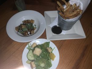 Tempura Eggplant, Arugula Salad, frites w/siracha chili sauce at Leon's Full Service in Decatur