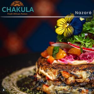 Nairobi Okonomiyaki 
Japanese style vegetable pancake topped with Kenyan spices, Kachumbari, homemade pickled vegetables, ginger and unami. at Chakula in Leiria