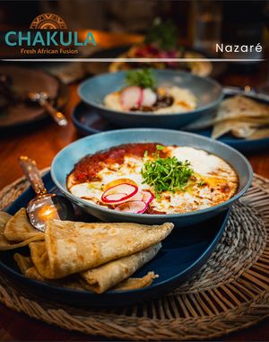 Saharan Shakshouka
Traditional Tunisian tomato stew with oven baked eggs, vegan feta and homemade bread at Chakula in Leiria