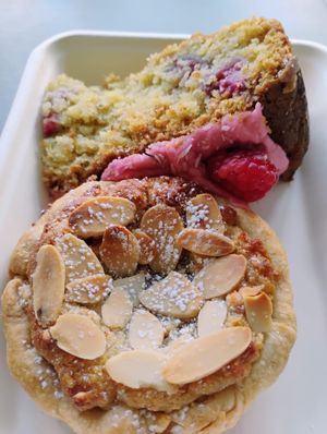 Almond Frangipani, and Raspberry & Coconut Cake as takeaway; hence a bit squashed at Vegan Garden London - Food Stand in South East London