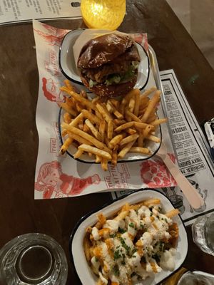 top to bottom: SoCol burger, fries, penthouse fries  at The Waiting Room in South East London