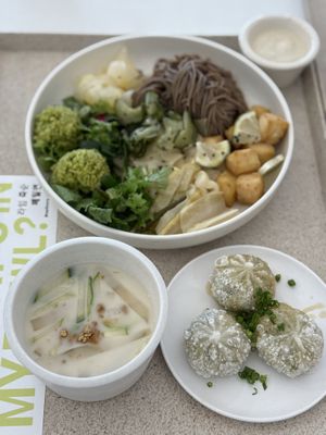 Summer special buckwheat noodle with separate sauce & side dishes. Kongmul (cold soy bean water) is a bit sweet. Buchu mandu (chive dumpling) with soy sauce were good.  at epikore - 에피코어 in Seoul