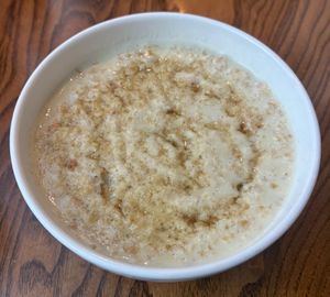 Soya porridge with maple syrup  at Thyme - Premier Inn Manchester Airport  in Manchester