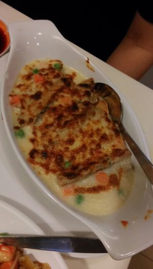 baked fish with cheese and butter at Sin Tak Fook Vegetarian in Kowloon