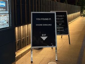 YOU FOUND IT. This sign marks the entrance to ENGINE SHINJUKU on B1, beside Hanazono Shrine—a hidden ramen dining experience with vegan and gluten-free options for everyone. at ENGINE SHINJUKU RAMEN in Tokyo