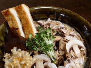 SHINJUKU M7ーVEGAN / A deep, savory vegan ramen built on seven kinds of mushrooms and a rich plant-based broth. / Allergy info: Wheat, Orange, Soybeans, Buckwheat at ENGINE SHINJUKU RAMEN in Tokyo