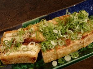 TOCHIO-AGE NANBAN MISO / Premium Tochio fried tofu filled with spicy Nanban miso, served with our special miso and crispy fried buckwheat groats. / Allergy info:  Soy, Buckwheat at ENGINE SHINJUKU RAMEN in Tokyo