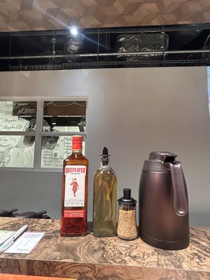 Condiments - chilli gin, kelp vinegar and sesame seeds   at ENGINE SHINJUKU RAMEN in Tokyo