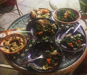 2 different salads, falafel on a plate and the eggplant puree at Falafel Abu Dany in Larnaca