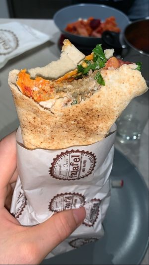 “Falafelguru India” aka. Falafel Wrap w/ Spicy Sauce and looots of delicious herbs & spices  at Falafel Abu Dany in Larnaca