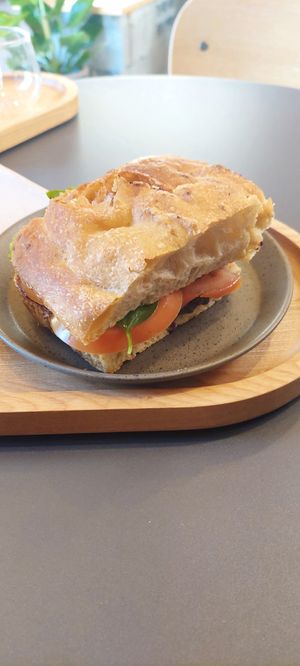 Focaccia with olive paste, tomato, and basil at Olmo Coffee&Co in Mem Martins