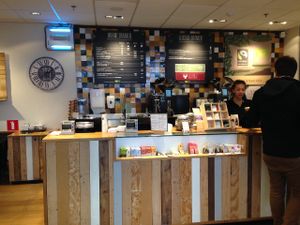 Counter to pay and order coffee at EXKi in Bruges