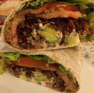 BLT wrap with coconut 'bacon', lettuce, tomato and avocado. yum and great with hot sauce too! at Green Bar in Muntinlupa