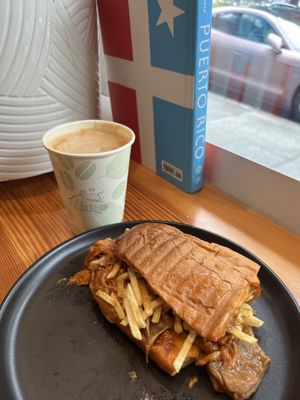 Biscocho latte and tripleta sandwich  at El Cerro in Seattle