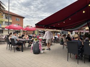 Outdoor seating from inside   at Wanpens Thai Food in Leksand