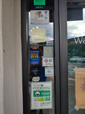 Safe Place! Happy Cow. VegNews. Postmates. Scan code for menu. at The Wayward Vegan in Seattle