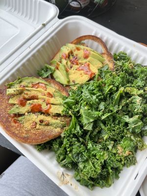 Avocado toast with a side of Kale (I had added hot sauce and nutritional yeast to my toast)  at The Wayward Vegan in Seattle