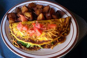 Veggie omelet with home fries. SO tasty. at The Wayward Vegan in Seattle