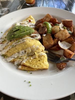 Sunshine omelette!!! So good    at The Wayward Vegan in Seattle