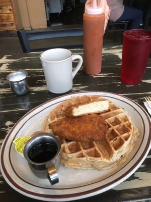 Savory waffle with a vegan schnitzel and maple syrup  at The Wayward Vegan in Seattle