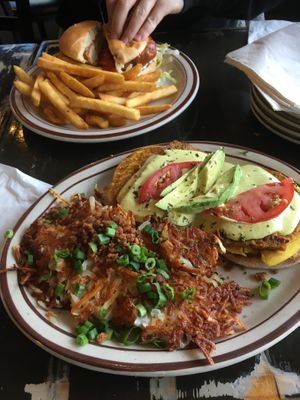 Hash browns and avocado with egg benedict  at The Wayward Vegan in Seattle