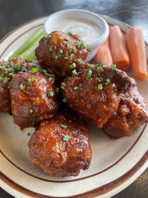 BBQ wings — I ordered buffalo so I was pretty disappointed they brought these. I hate BBQ sauce. Taste like chicken tho  at The Wayward Vegan in Seattle