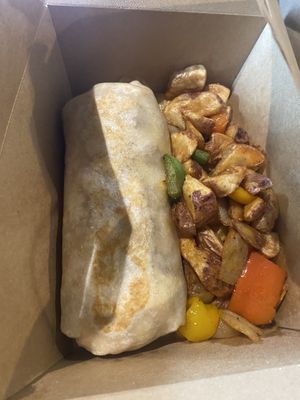 Tots in a blanket burrito  at The Wayward Vegan in Seattle