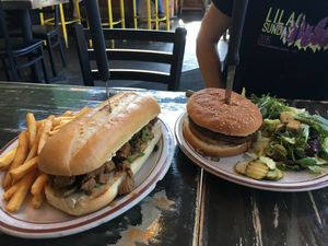 Philly steak and rich burger at The Wayward Vegan in Seattle
