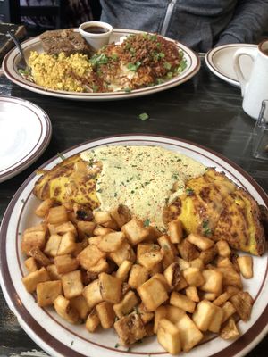 Steak plate (breakfast menu) and chicken florentine omelet. at The Wayward Vegan in Seattle