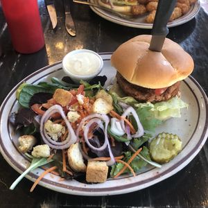 Bruschetta Burger with Side Salad at The Wayward Vegan in Seattle