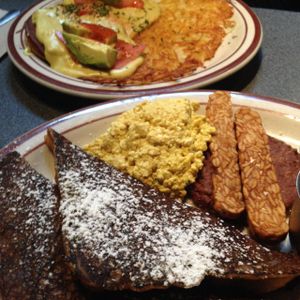 Griddle combo (French toast) & Eggs Benedict (back) at The Wayward Vegan in Seattle