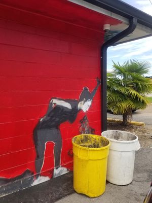 Cool/weird mural out back!? at MJ's Cafe in Baton Rouge