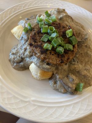 Biscuits with mushroom and sausage gravy with an impossible patty   at MJ's Cafe in Baton Rouge