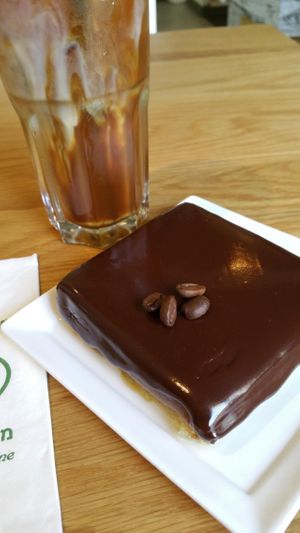 Vegan Tiramisu and iced coffee with almond milk at Village Green in Tel Aviv