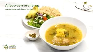 Traditional fully whole food, plant-based Ajiaco santafereño with oyster mushrooms, brown rice, avocado and salad at Bien Plantado - Vegan Food (Temporary Closed) in Loreto