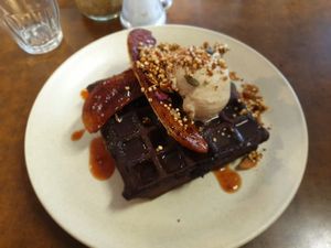 Vegan double choc waffles with baked banana & hazelnut ice cream at Straight Up in Hobart