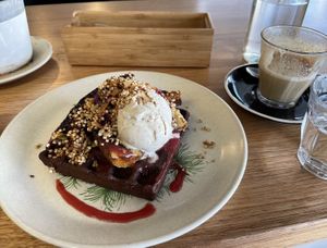 The dark choc waffle topped with banana and  plant-based ice cream. Amazing   at Straight Up in Hobart