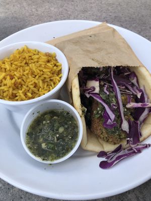 Baked Falafel Pita Sandwich (no Feta or tzatziki, sub Israeli Skhug) at Zoës Kitchen in Peachtree City