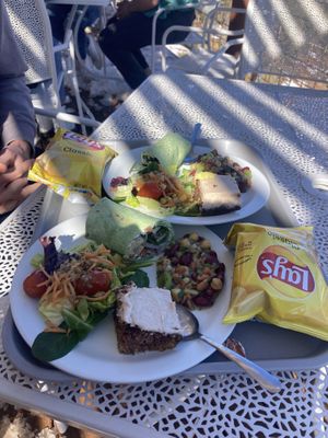 Spinach wraps, chickpea salad, salad bar & cinnamon cake dessert; love love this sanctuary, including the buffet, views, cause, etc.   at Angel Village Cafe in Kanab